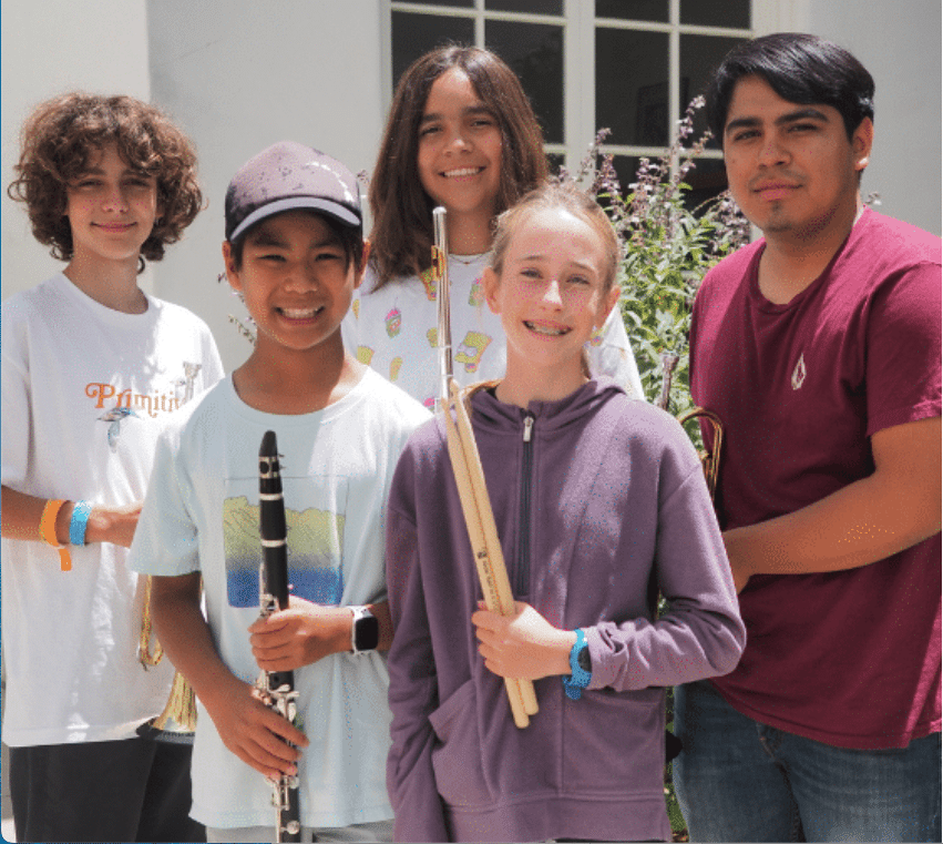 SBEF Signature Program - Summer Music Camp students holding their instruments