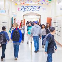 FISCALLY SPONSORED program UNHOUSED-STUDENT-SUPPORT-FUND students in a santa barbara school hallway